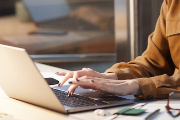 serious-businesswoman-typing-on-laptops.jpg
